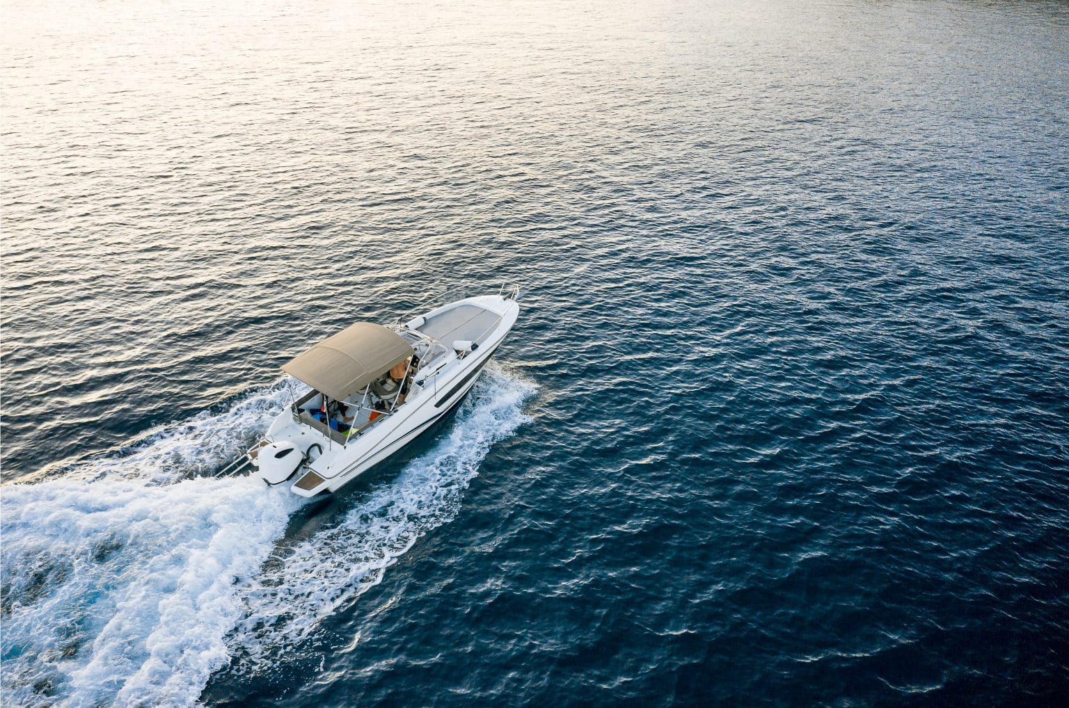 Boat on the lake representing the Progressive Lake Life campaign